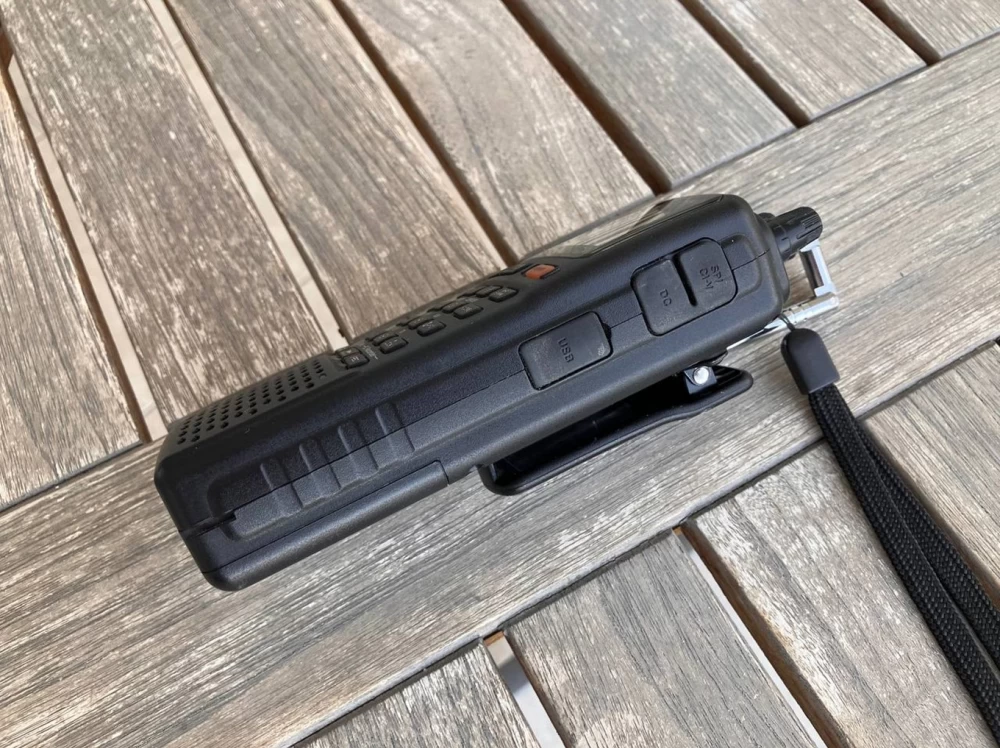 
Icom IC-R20 with connected headphones for listening
