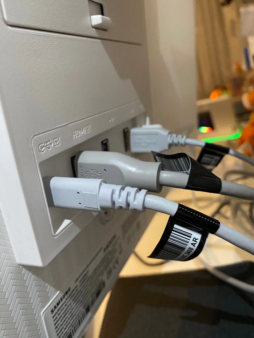 Samsung Smart Monitor M8 with the screen on, displaying bright colors.