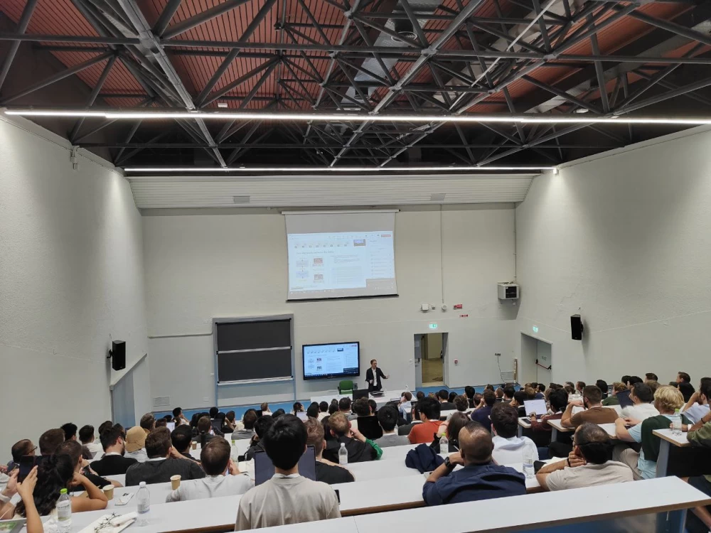 A group of researchers discusses their reports at ACM RecSys 2024.
