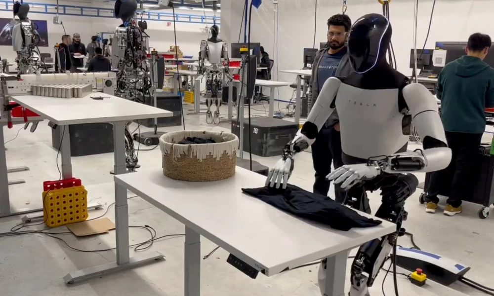 Optimus from Tesla folds a shirt