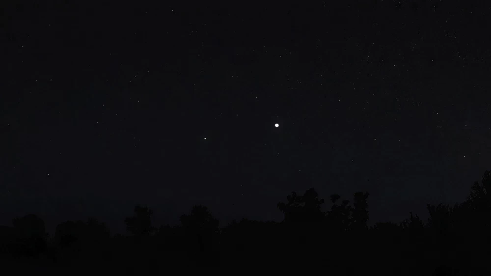 Two bright points in the center of the frame – Saturn and Jupiter