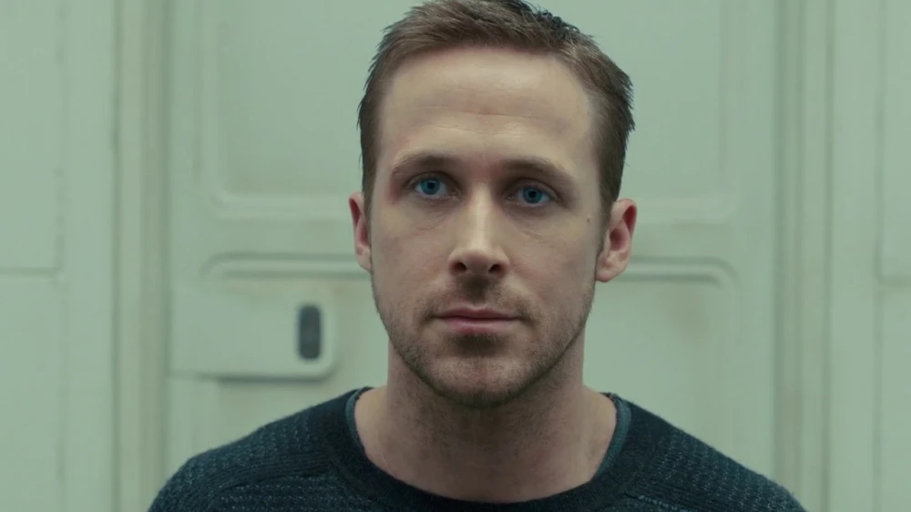 A screen with text on a monitor, a notebook with notes nearby, inscription on the screen: 