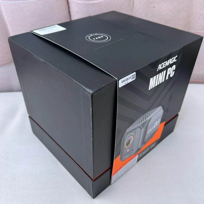   
Compact cubic case of the Acemagic Tank 03 with illuminated fans  
