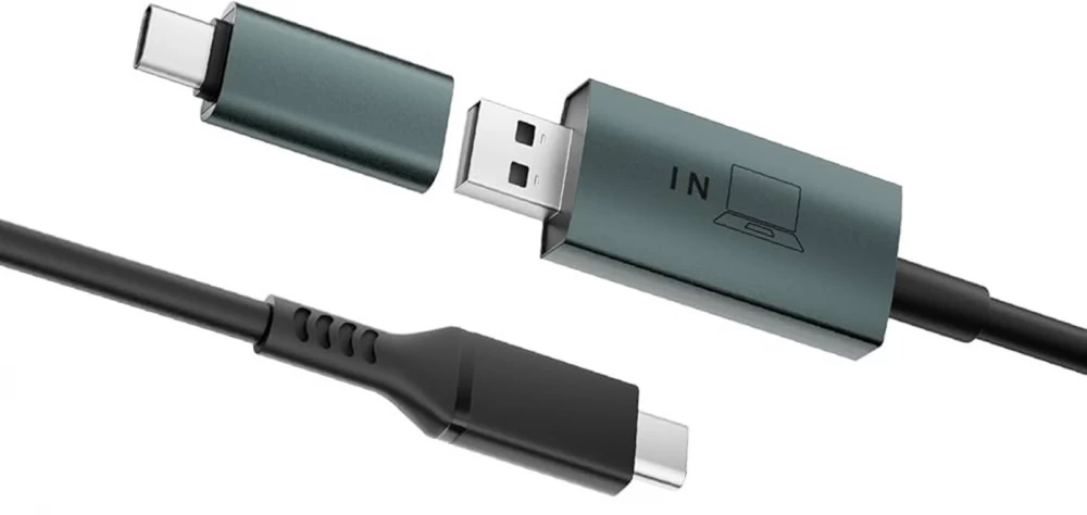 
A laptop with two additional screens, creating the image of a Cheburashka
