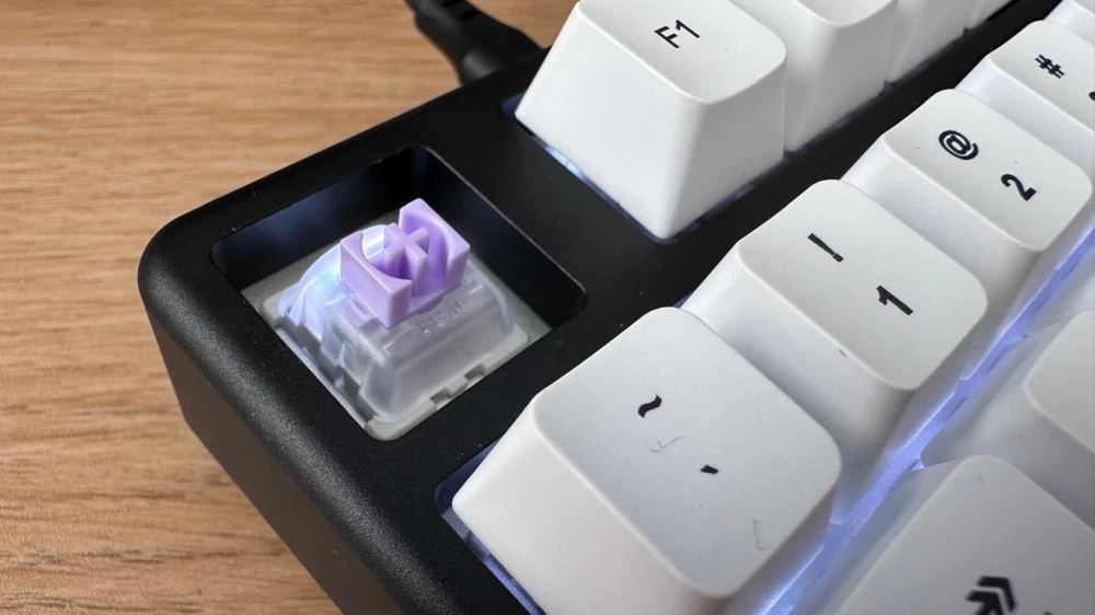 Arbiter Studio Polar 75 Pro keyboard with RGB backlight in a dark room.
