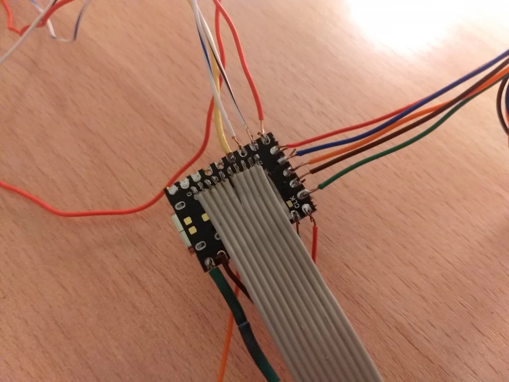 A piece of FDD cable is well suited for the back side