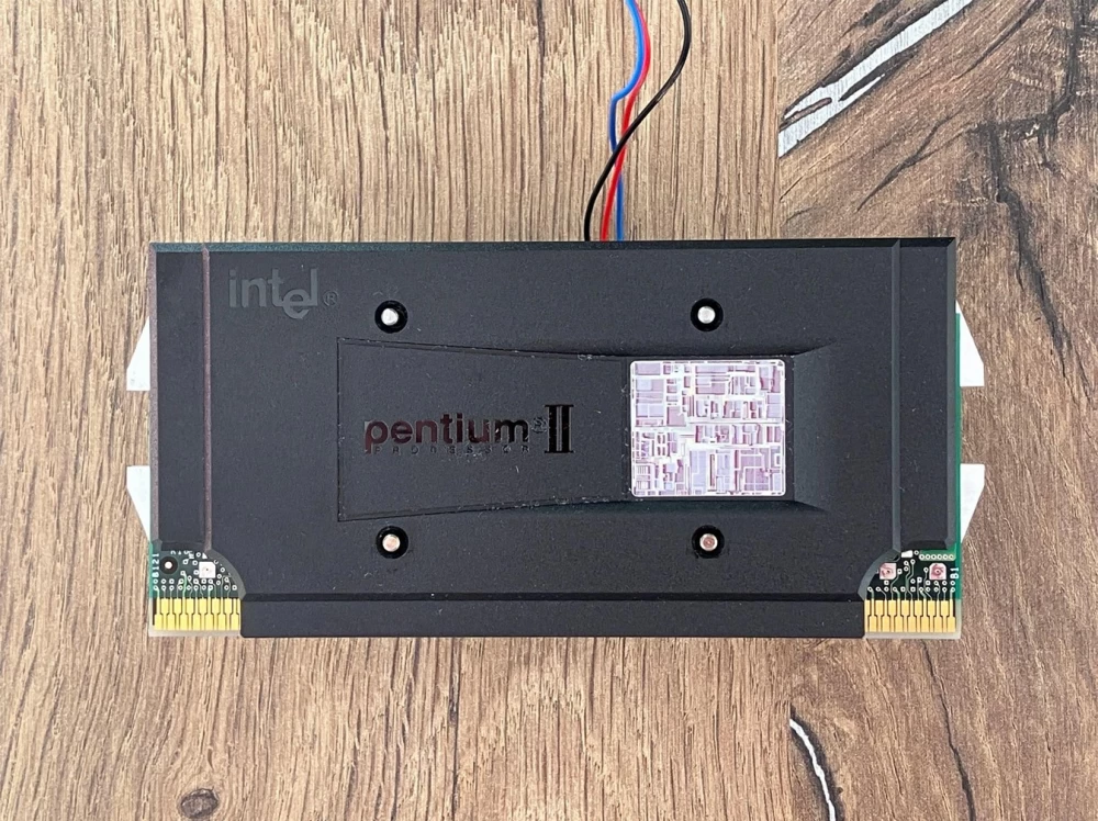 The process of assembling a retro computer: parts, tools, and inspiration in one frame.