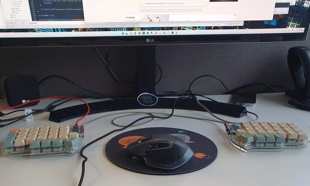 At some point, the mouse migrated to the location between the halves. It turned out that to press the key with the left hand from the right half, I would have to cross my hands