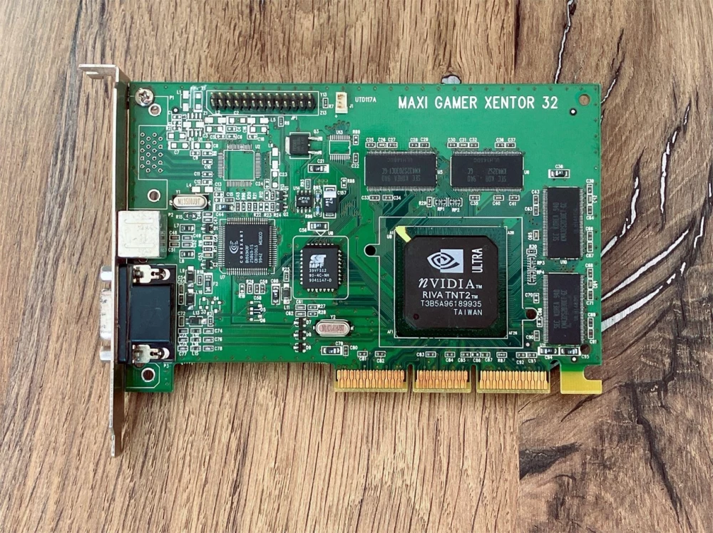 Comparison of old and new: retro computer next to a modern PC.