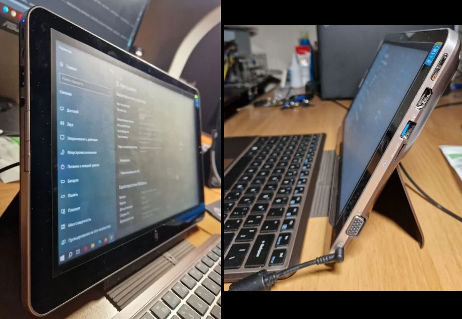 Windows tablet on the table, next to the keyboard and mouse.
