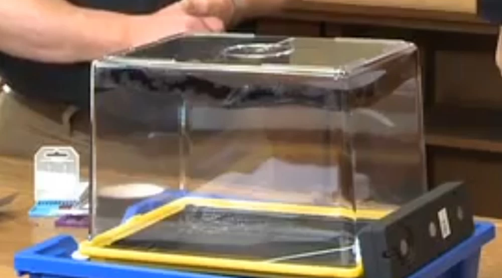 A group of scientists discussing an experiment to test the theory of relativity.