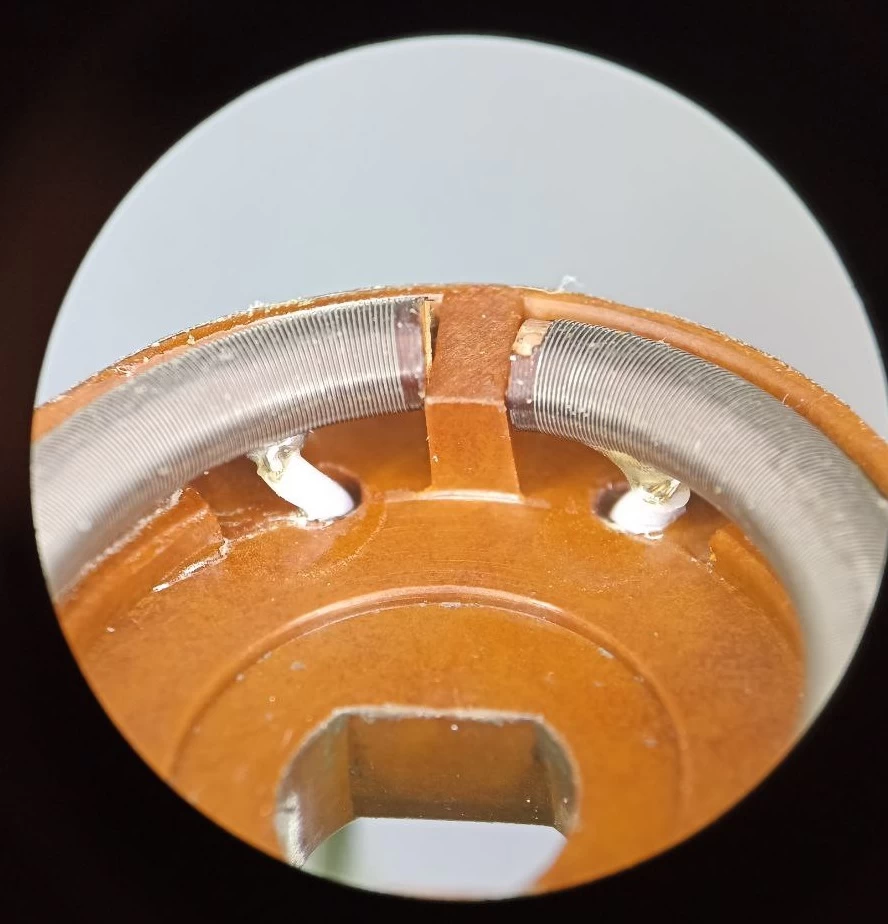 
Resistor with color bands to determine resistance value and power rating.
