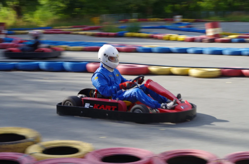 Professional driver at the wheel of the kart
