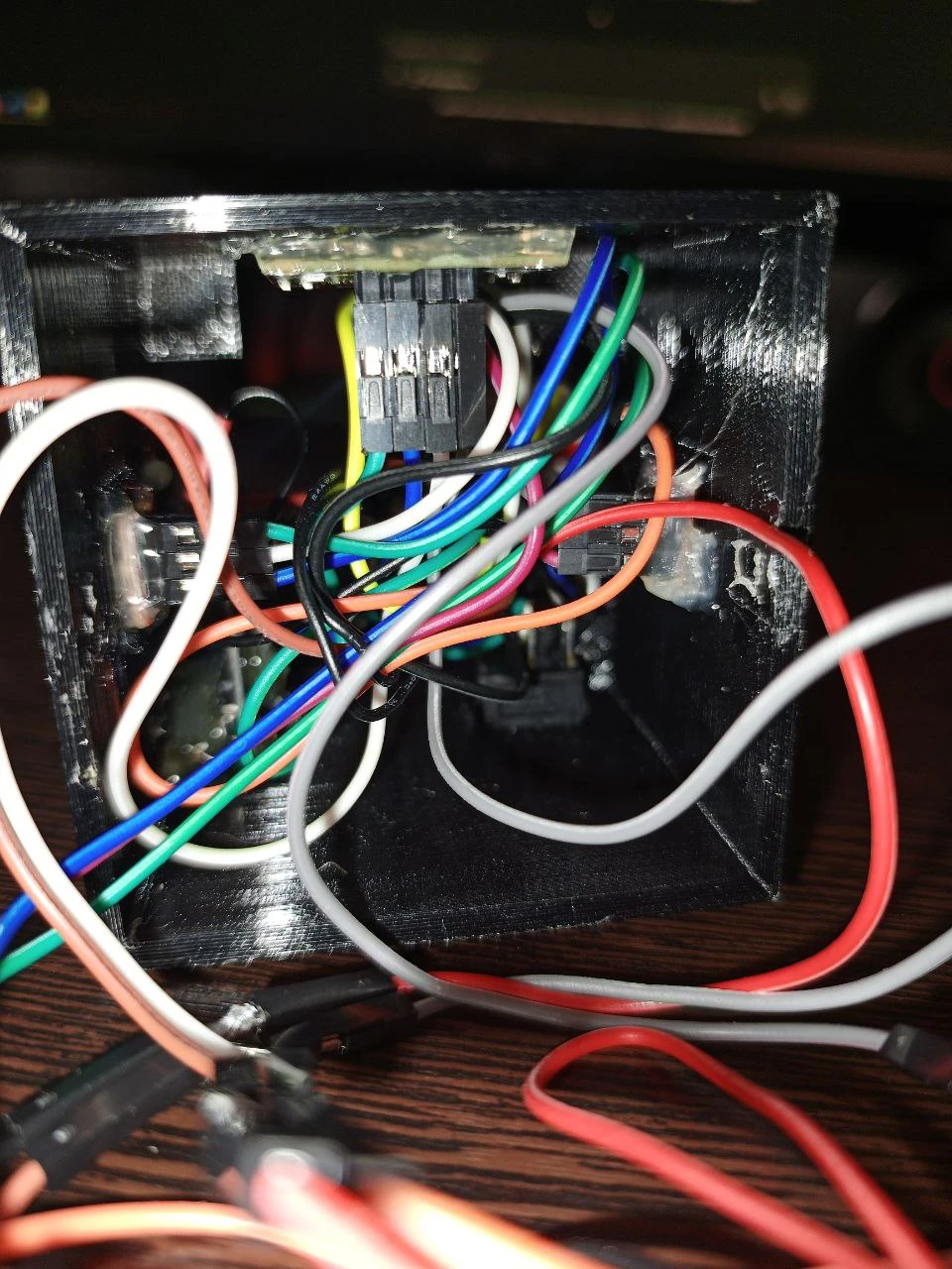 Internals: components and connections inside the case.