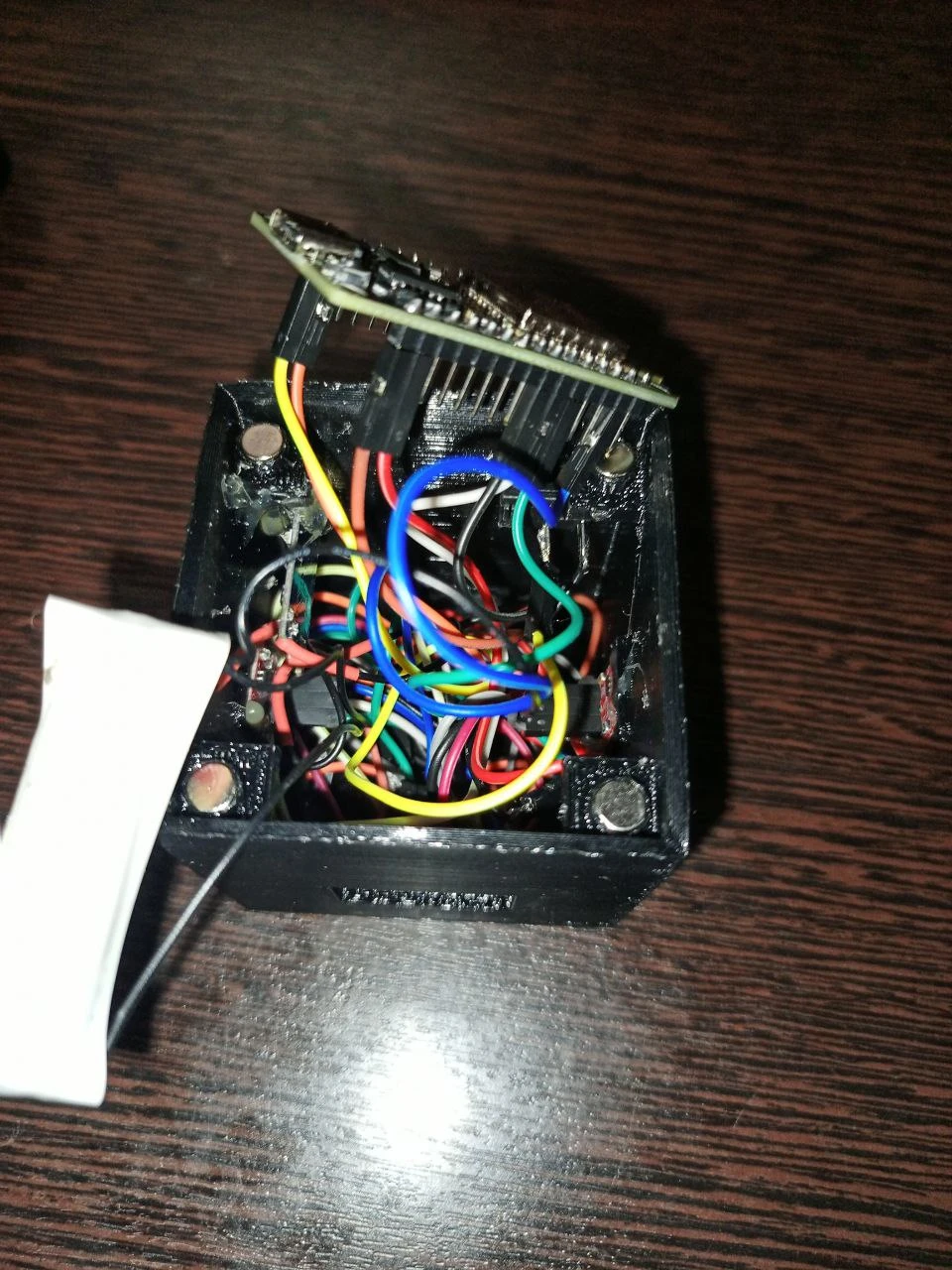 Internals: components and connections inside the case.