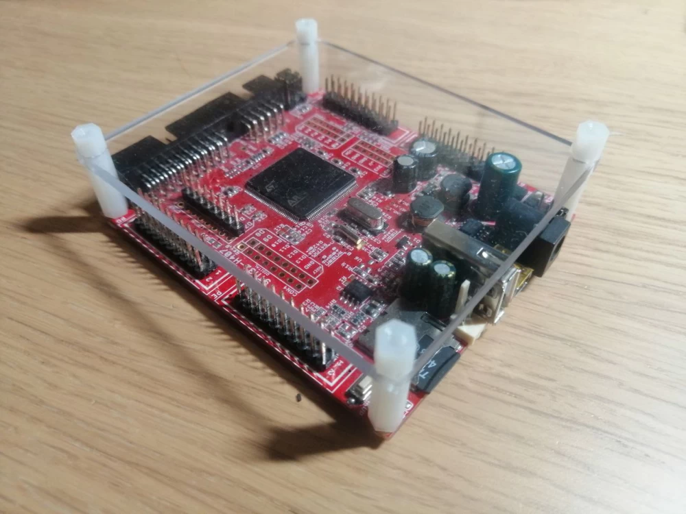 
Olimex-H407 Board with installed PasTilda, side view demonstrating the connection and operation of the device.
