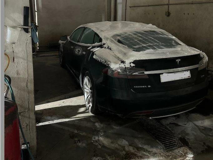 Driving into the car wash from the frost