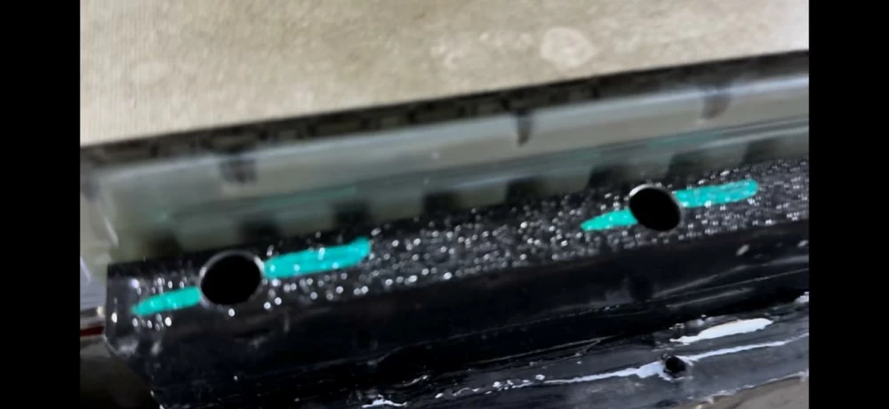 The photo is not very good quality, but the moisture is clearly visible