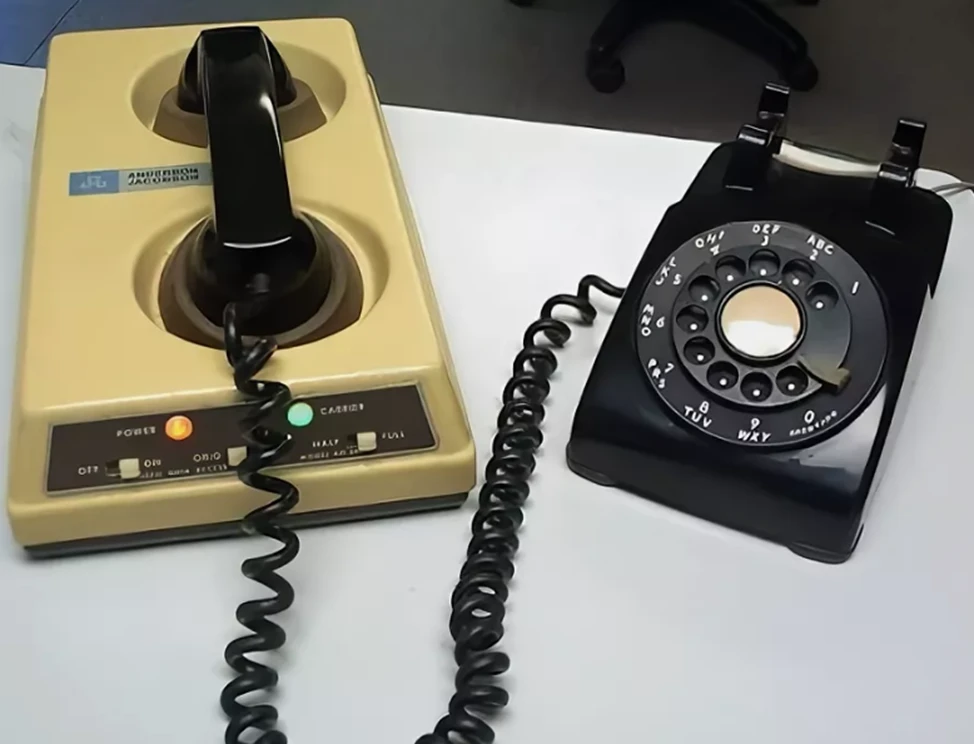 A black-and-green computer screen with a Unix-like terminal and a list of newsgroups