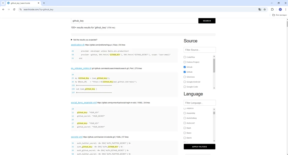 Close-up of hands typing on a laptop keyboard.