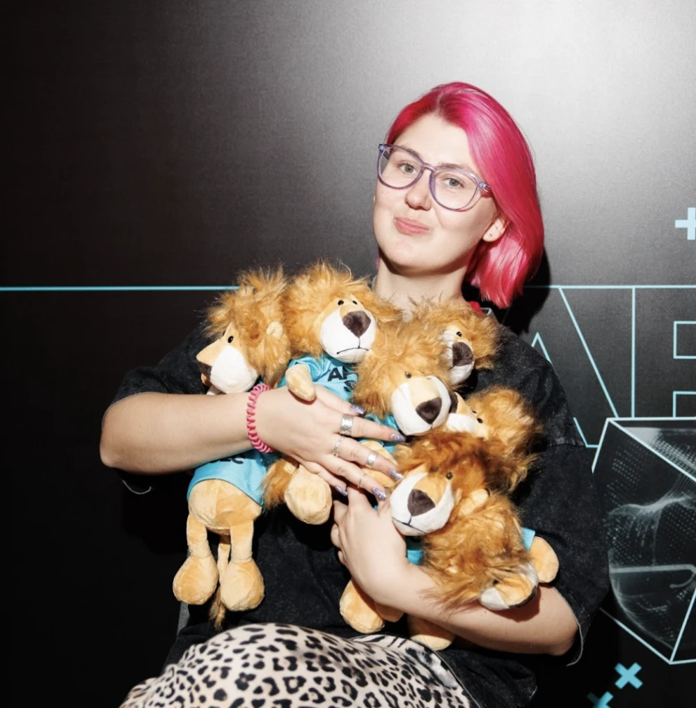 A group of programmers discusses vulnerabilities found at the booth