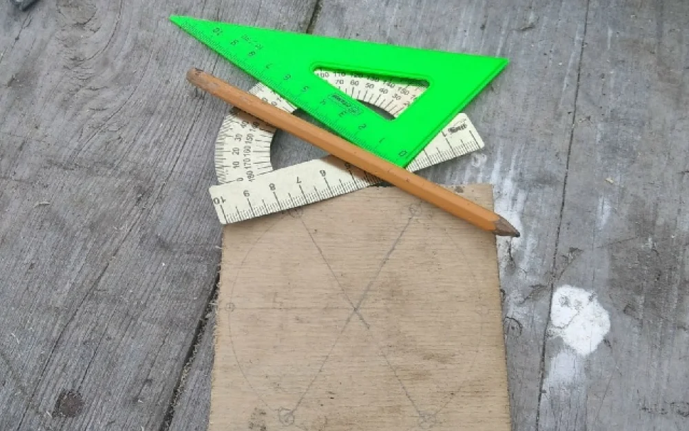 Model of an Alternating Current Generator Made from Available Materials