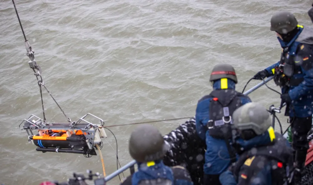 Demonstration of the underwater robot, it is launched to inspect the condition of the internet cable